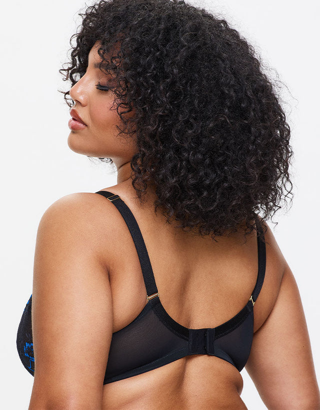 sexy transvestites in lingerie Studio shot of young pretty African American woman with curvy body wearing  minimalist lingerie sitting on floor and looking at camera while posing on  coffee color cyc wall main image 1